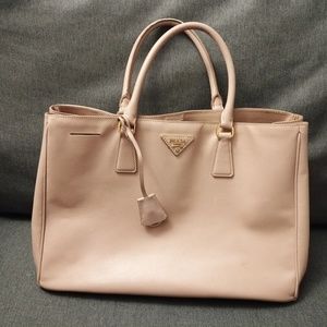 Blush pink Prada tote.